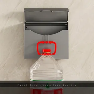 Gunmetal gray wall-mounted tissue box with hooks demonstrating strong weight capacity