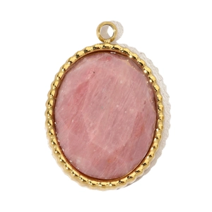 Detail of an oval gold-plated pendant featuring an inlaid pink natural stone center