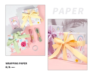 Gift wrapping paper set with rainbow hearts and unicorn patterns including ribbons and twine