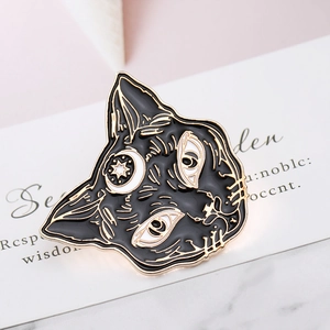 Punk style black cat enamel brooch with golden moon and star detail on white card