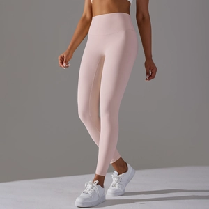Detail of high waisted nude feel yoga leggings showing seamless hip lifting design