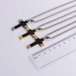 Men's carbon fiber cross necklaces in silver, gold and rose gold on white background