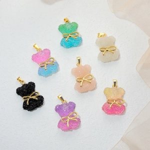 Cute resin bear pendants with golden bowties in seven colorful gradients for DIY jewelry