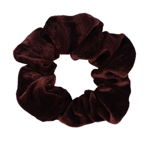 Detailed texture of chocolate brown velvet scrunchie showing soft fabric and sheen