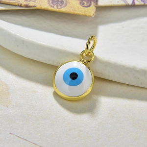 Golden round Evil Eye charm with blue and white enamel for DIY jewelry making
