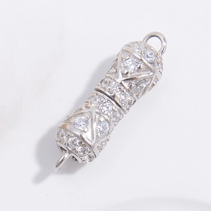 Macro shot of S925 silver connector with micro-p鑲zirconia for DIY bracelets and necklaces