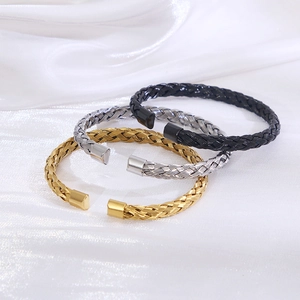 Vintage-Manschettenarmbänder aus geflochtenem Edelstahl in Gold, Silber und Schwarz