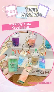 Set of five cute cat milk tea cup keychains in vibrant colors with holographic straps
