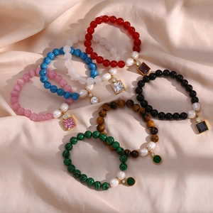 Fashionable beaded bracelets with natural stones, freshwater pearl and golden pendants