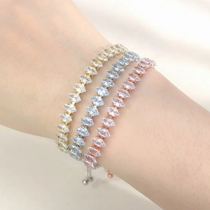 Detailed shot of marquise-cut zircon tennis bracelets in gold, silver, and rose gold