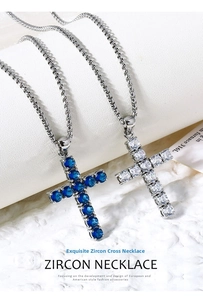Detail of 316L stainless steel cross necklaces with blue and clear zircon stones