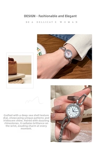 Detailed view of silver quartz watch with shell texture dial and rhinestone bezel