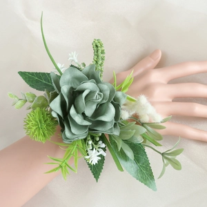 Dusty green artificial rose wrist corsage with silk leaves and white berries for weddings