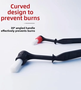 Detail of 30-degree angled coffee machine cleaning brush with heat protection handle