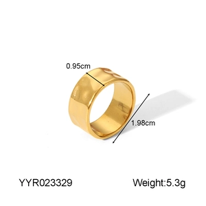 Detailed view of striped golden stainless steel ring showing 0.95cm width dimensions