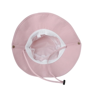 Detail view of pink sun hat featuring breathable mesh lining and adjustable chin strap