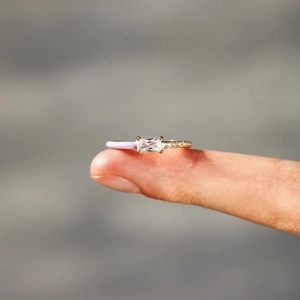 Detail of s925 silver ring with purple enamel, rectangular zircon and gold plating