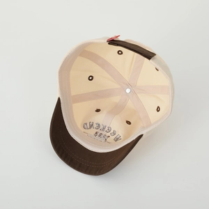 Internal view of a six-panel cotton canvas baseball cap with reinforced stitching and ventilation