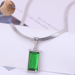Sleek silver flat snake chain necklace with rectangular emerald green gemstone pendant