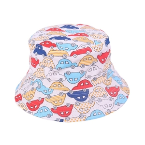 Detailed close-up showing colorful cartoon car prints on white cotton kids bucket hat