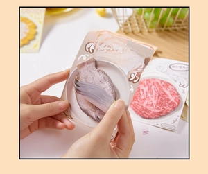 Close-up of food-shaped sticky notes showing realistic texture and easy-tear design