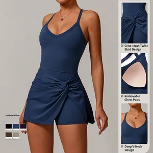 Navy blue tennis dress with V-neck, twist hem and built-in shorts for active women