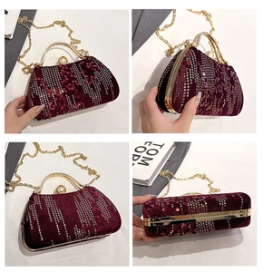 Detail view of burgundy sequin evening clutch bag with gold handle and pearl clasp