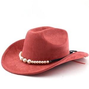 Detailed view of a red suede cowboy hat featuring elegant white pearl bead decorations