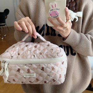 Pink quilted cotton cosmetic bag with cute cartoon bear and bunny patterns for travel