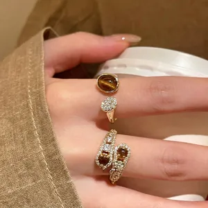 Vintage gold plated tiger eye stone ring set with zircon accents for elegant women