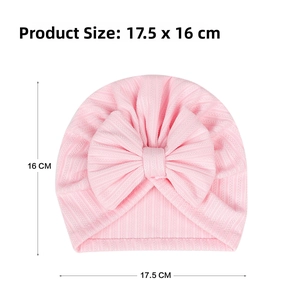 Pink newborn baby turban hat with large bow and size dimensions 17.5x16cm