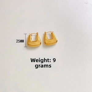 Detailed view of polished gold U-shape earrings measuring 25mm in height and weighing 9g