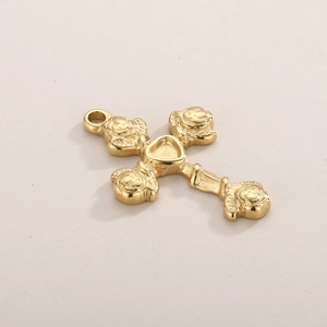 Polished gold stainless steel cross pendant with rose flower details and heart center