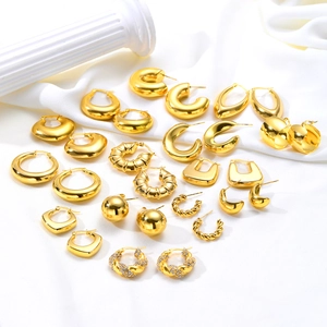 Collection of minimalist gold-plated geometric hoop earrings with textured metal finishes