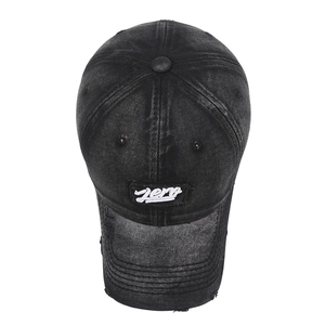 Vintage washed denim baseball cap with zero embroidery and distressed ripped brim details