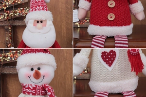 Detail of Christmas plush figurines showing knit textures and embroidery on Santa and Snowman