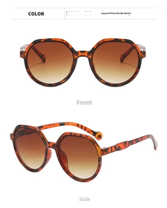 Detailed views of leopard print round sunglasses with brown gradient lenses
