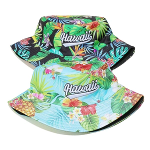 Tropical Hawaii bucket hats with palm leaf print and white letter embroidery