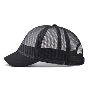 Side view of black mesh short brim baseball cap with breathable texture on white background