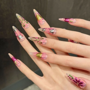Tropical style long stiletto press-on nails with 3D floral and metallic bow charms