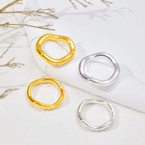 Minimalist wave texture stainless steel ring set in polished gold and silver finish
