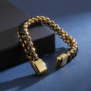 Bracelet pour homme en acier inoxydable doré avec cuir noir tressé et fermoir magnétique