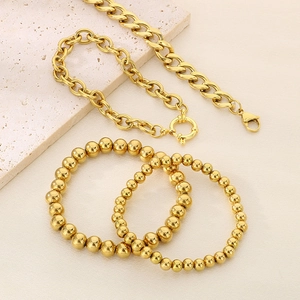 Minimalist 4-piece gold stainless steel bracelet set with Cuban links and metal beads