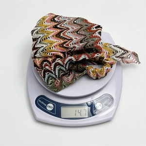 Maillard style retro printed mesh triangle headscarf weighing 14.7g on a digital scale
