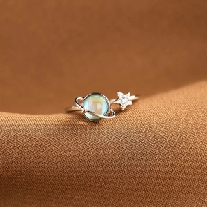 Minimalist S925 sterling silver ring with blue planet and sparkling star design