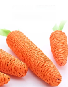 Detail of handmade woven carrot cat toy made of durable paper rope for chewing