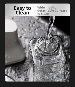 Close-up of wide mouth glass oil bottle showing easy water filling and cleaning