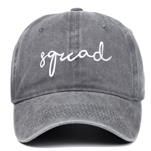 Dark grey washed denim baseball cap with white SQUAD embroidery in a vintage style