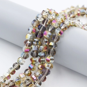 Macro shot of 8mm faceted multi-color crystal glass beads with iridescent coating