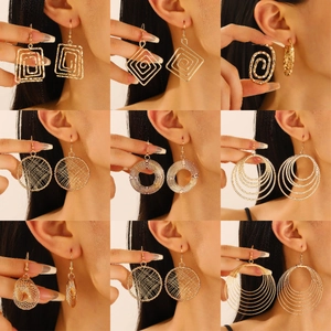 Orecchini a Cerchio con Stella in Metallo Avvolto Retrò per Donna Orecchini Pendenti a Stella a Spirale in Lega Geometrica Gioielli Party